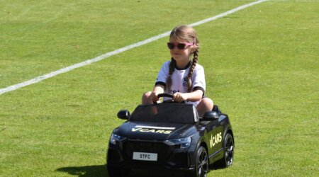 Foundation Participants Drive out the Match Ball!